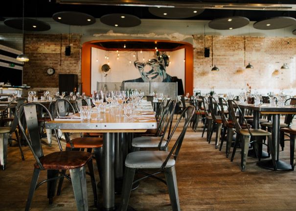 dining room with chairs and tables and industrial furnishings