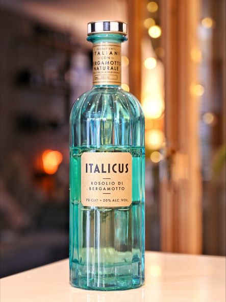 a bottle of liqueur with ambient lighting
