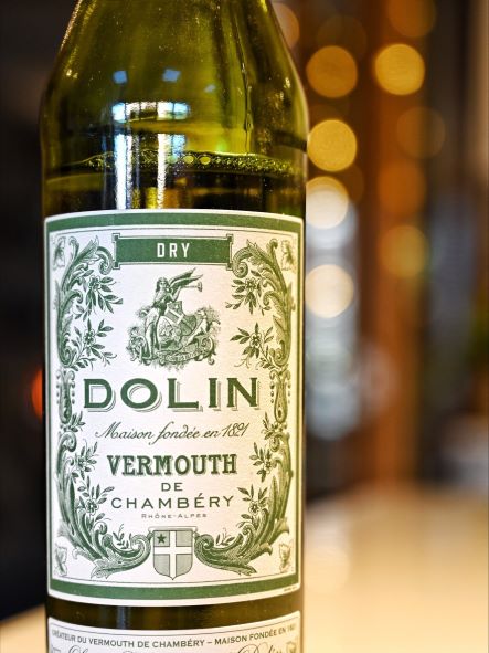 a bottle of vermouth with ambient lighting