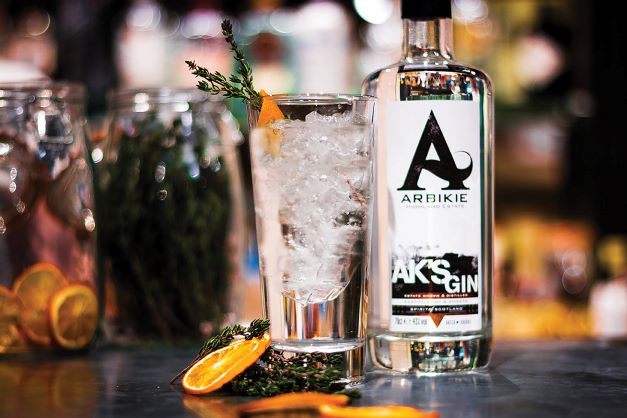 ak's gin served in a gin and tonic with thyme and a citrus twist