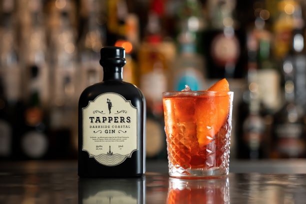 A BOTTLE ON DARKSIDE GIN IN A NEGRONI COCKTAIL
